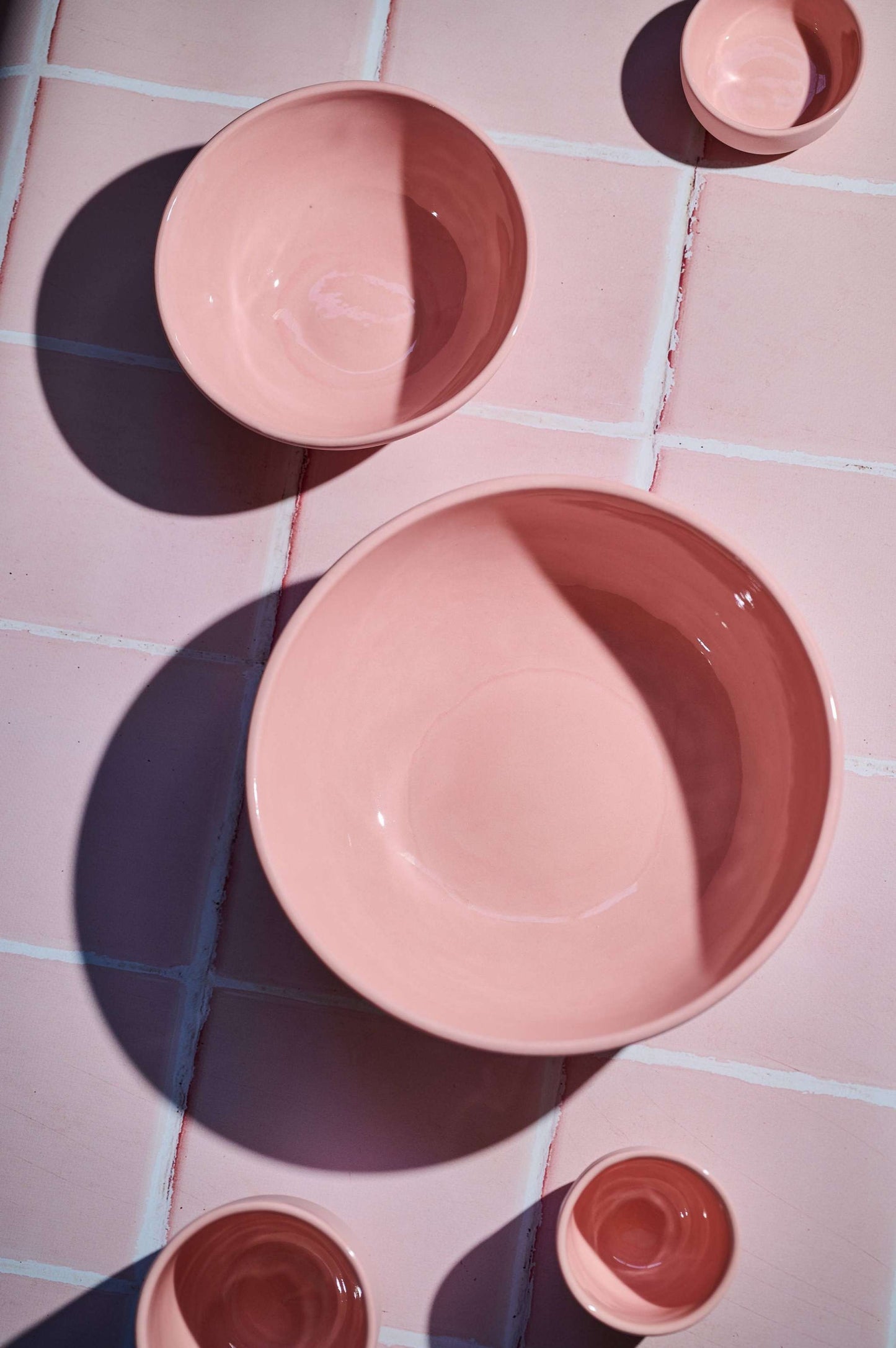 Handmade porcelain salad serving bowl in powder pink with shiny glaze, food-safe and dishwasher safe