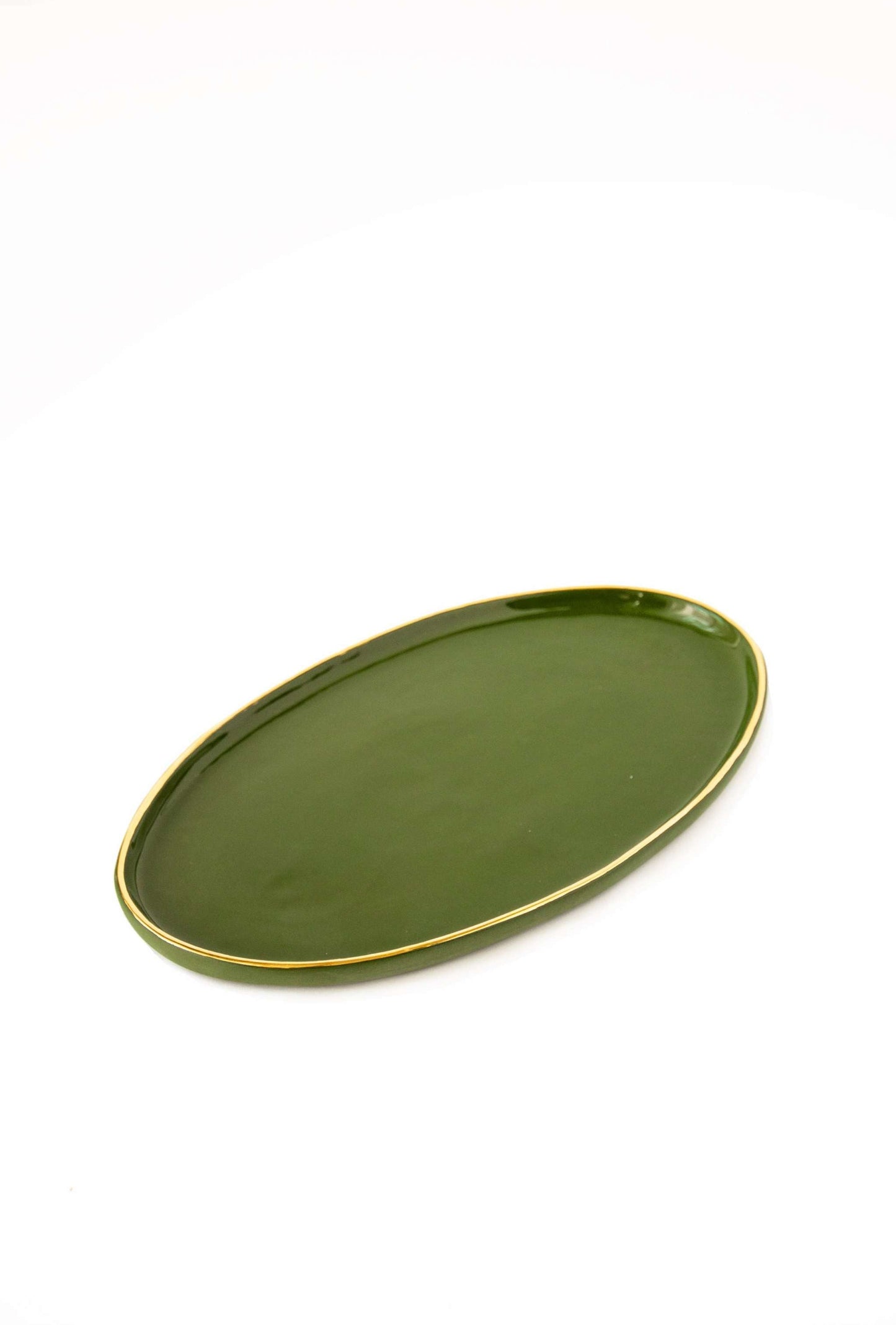 Handmade green porcelain oval serving platter with gold rim and organic edges