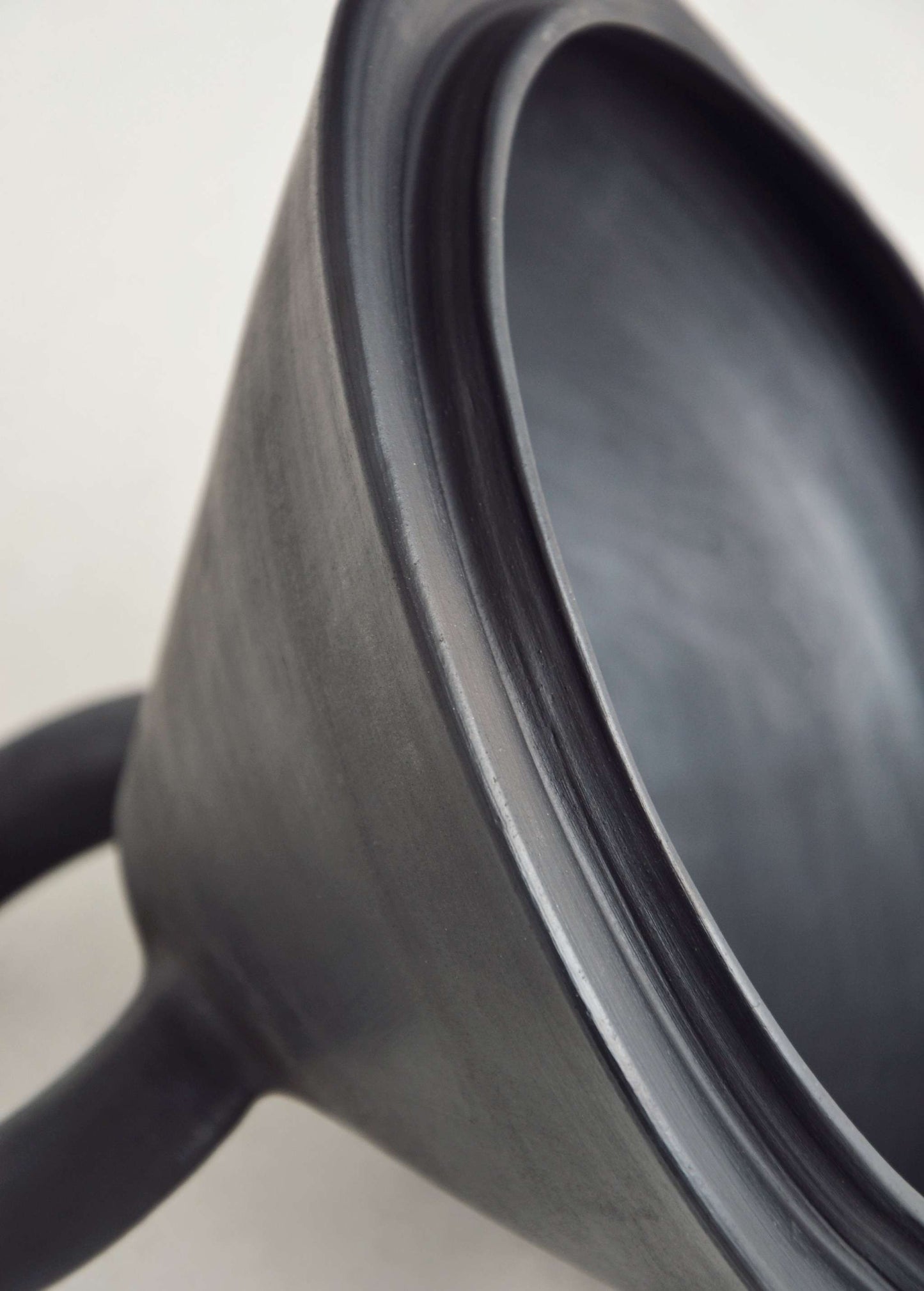 Handmade shallow serving bowl with lid in black smoked ceramics by Danuta Kril, made in Ukraine
