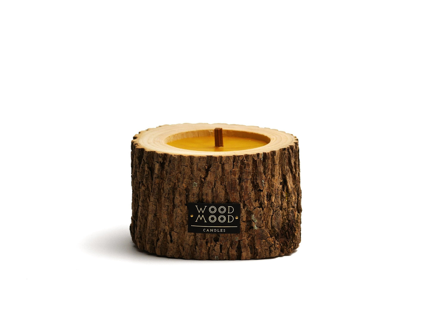 Rocky Wood Candle with multi-layer wick and winter spruce scent on wooden base
