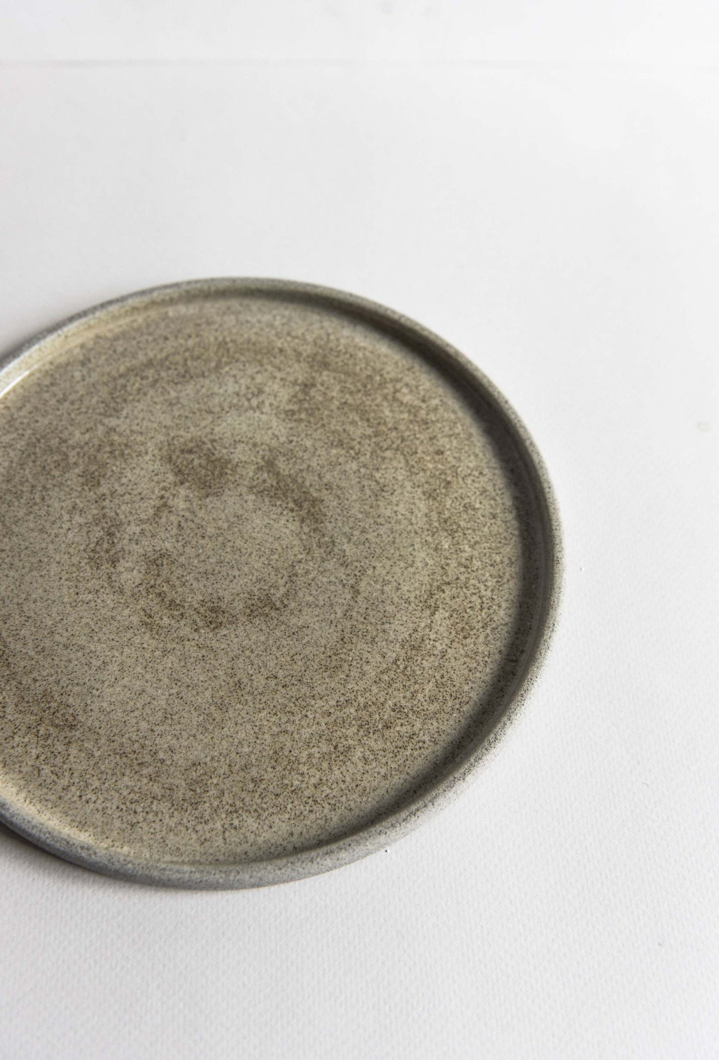 Stoneware dinner plates "Concrete" with rough exterior and glossy interior, handmade in Ukraine