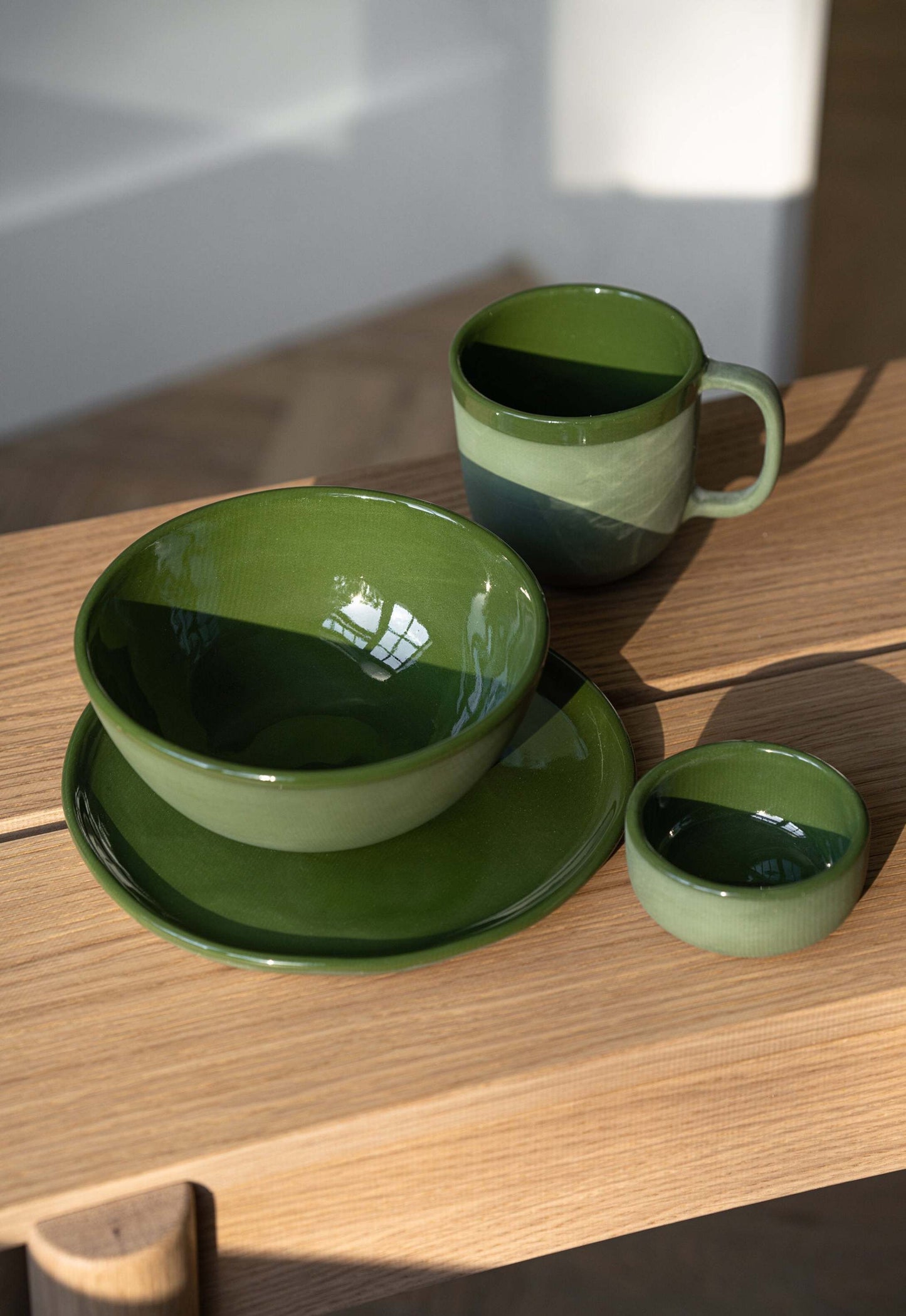 Handmade green porcelain bowl with shiny food-safe glaze, made in Ukraine