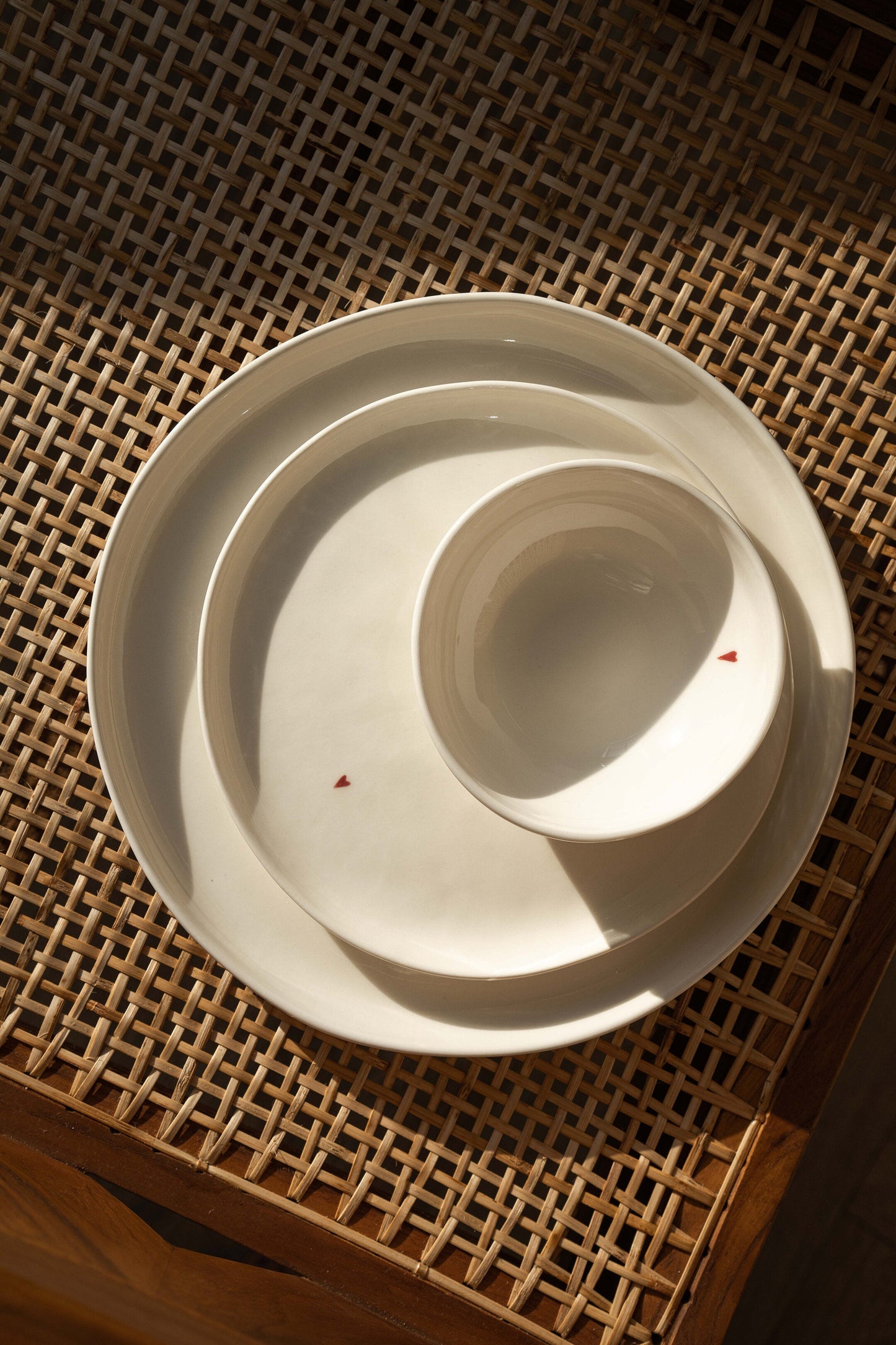 Off-white handmade porcelain bowl with red heart and thank you message, glazed and food-safe