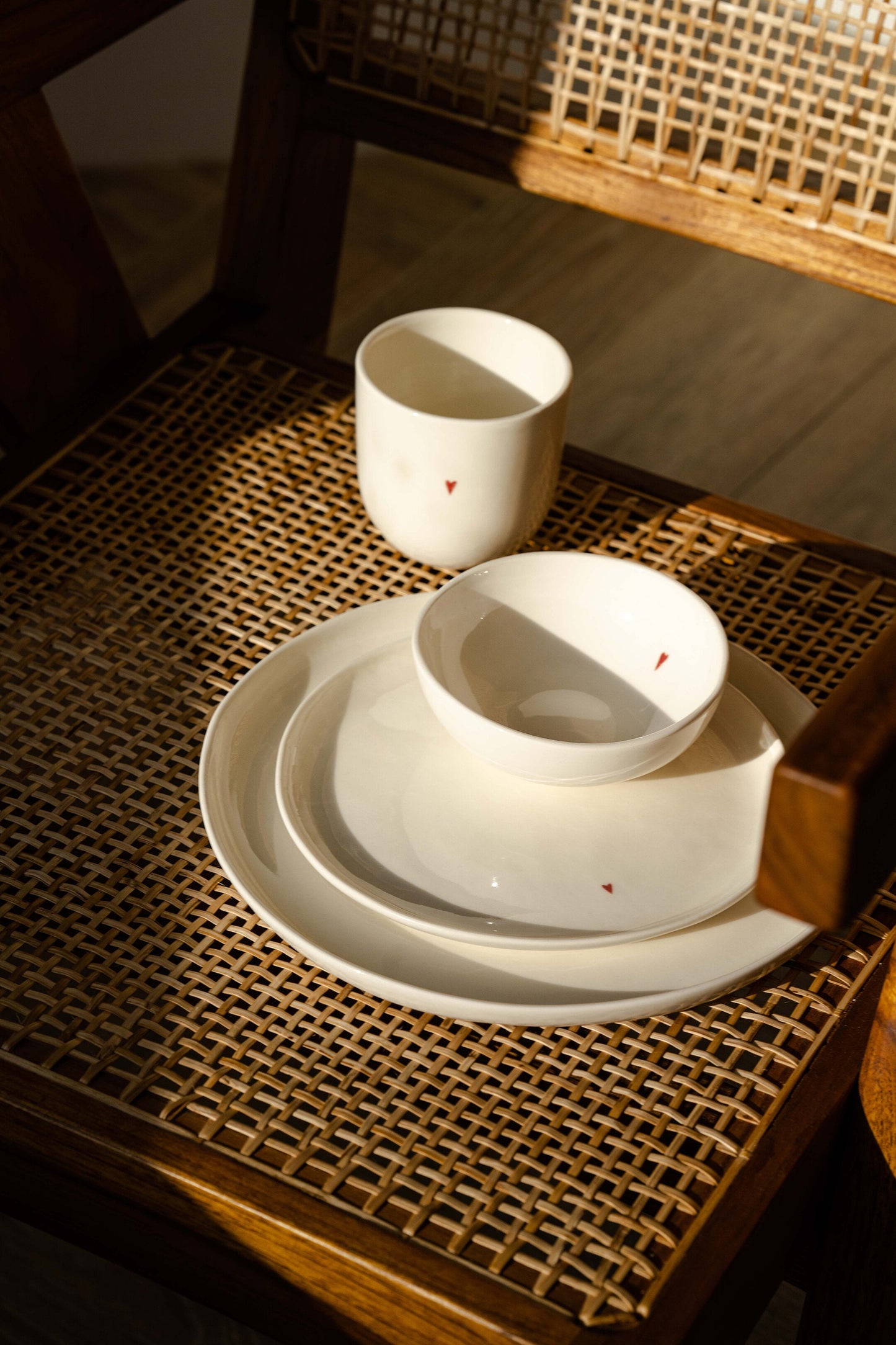 Handmade off-white porcelain dinner plates with red heart and inscription, dishwasher safe set