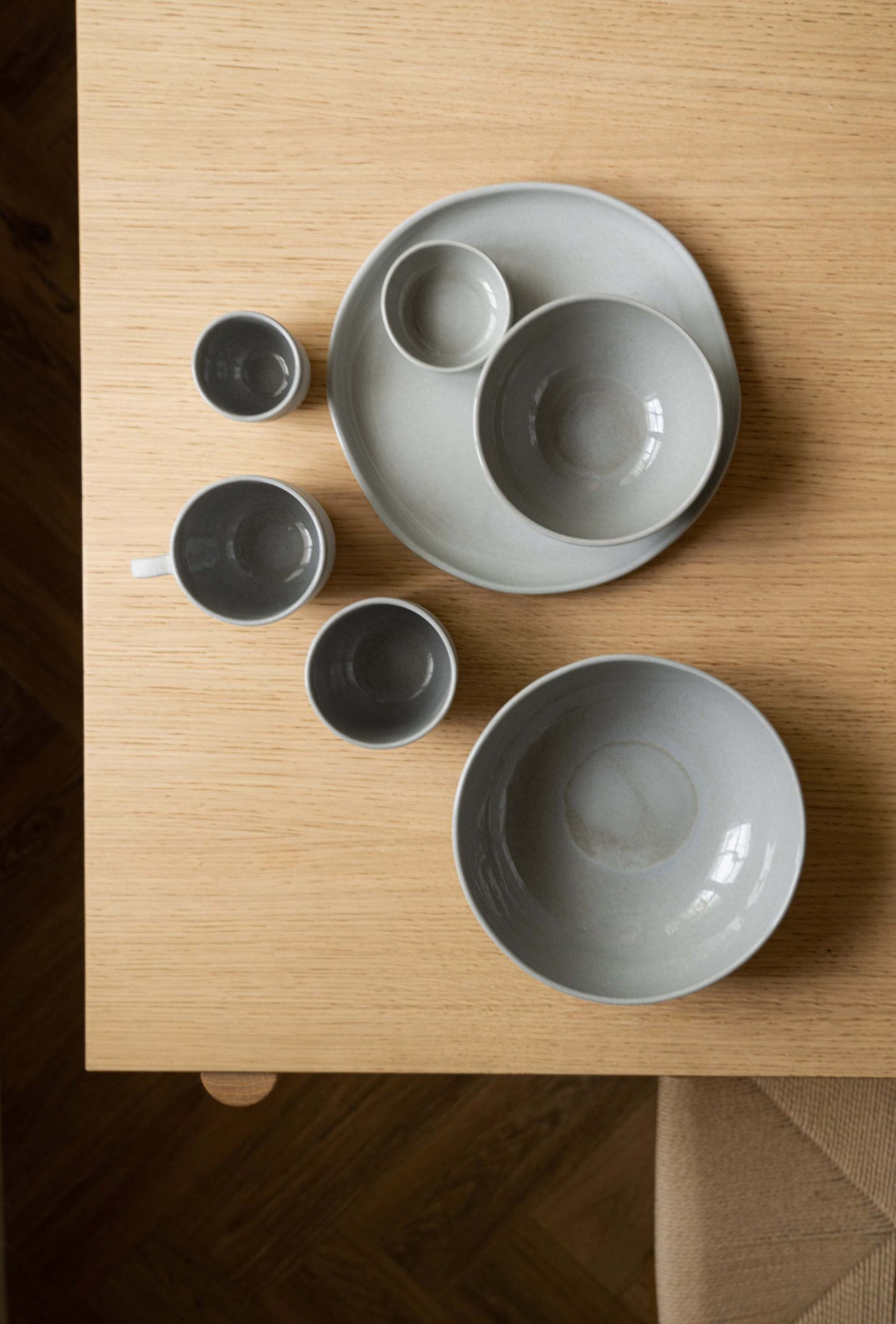 Handmade gray porcelain pinch bowl for serving condiments, food-safe and microwave-safe design