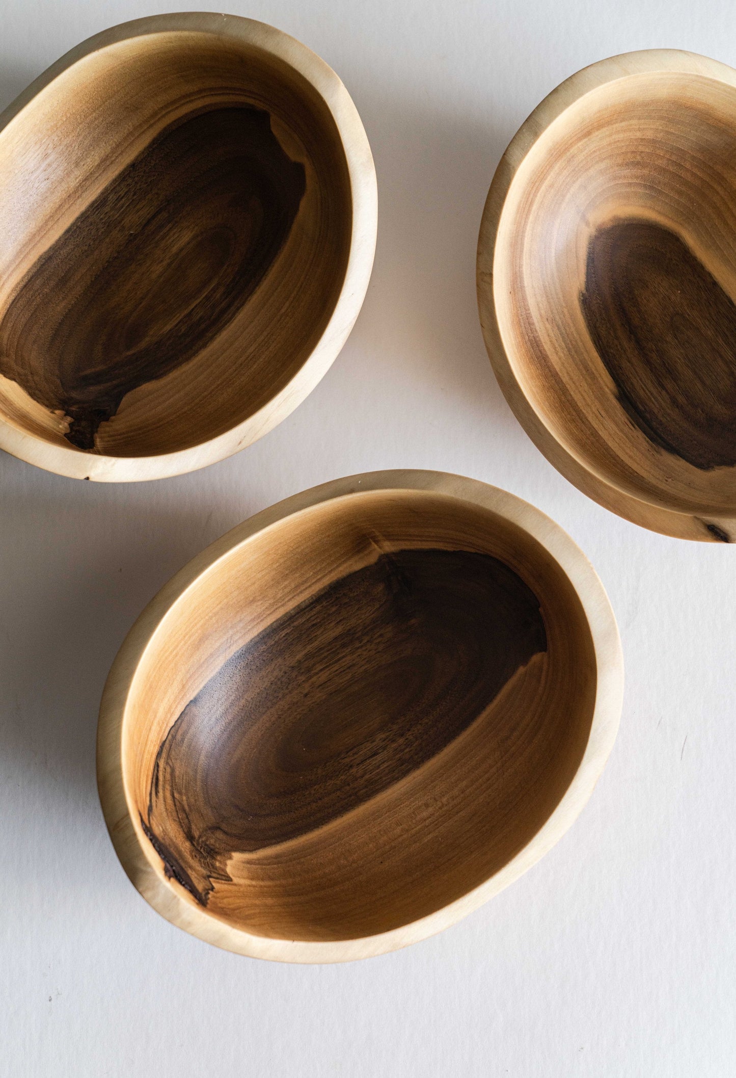 Hand carved small wooden walnut bowl with natural wood rings and oil finish