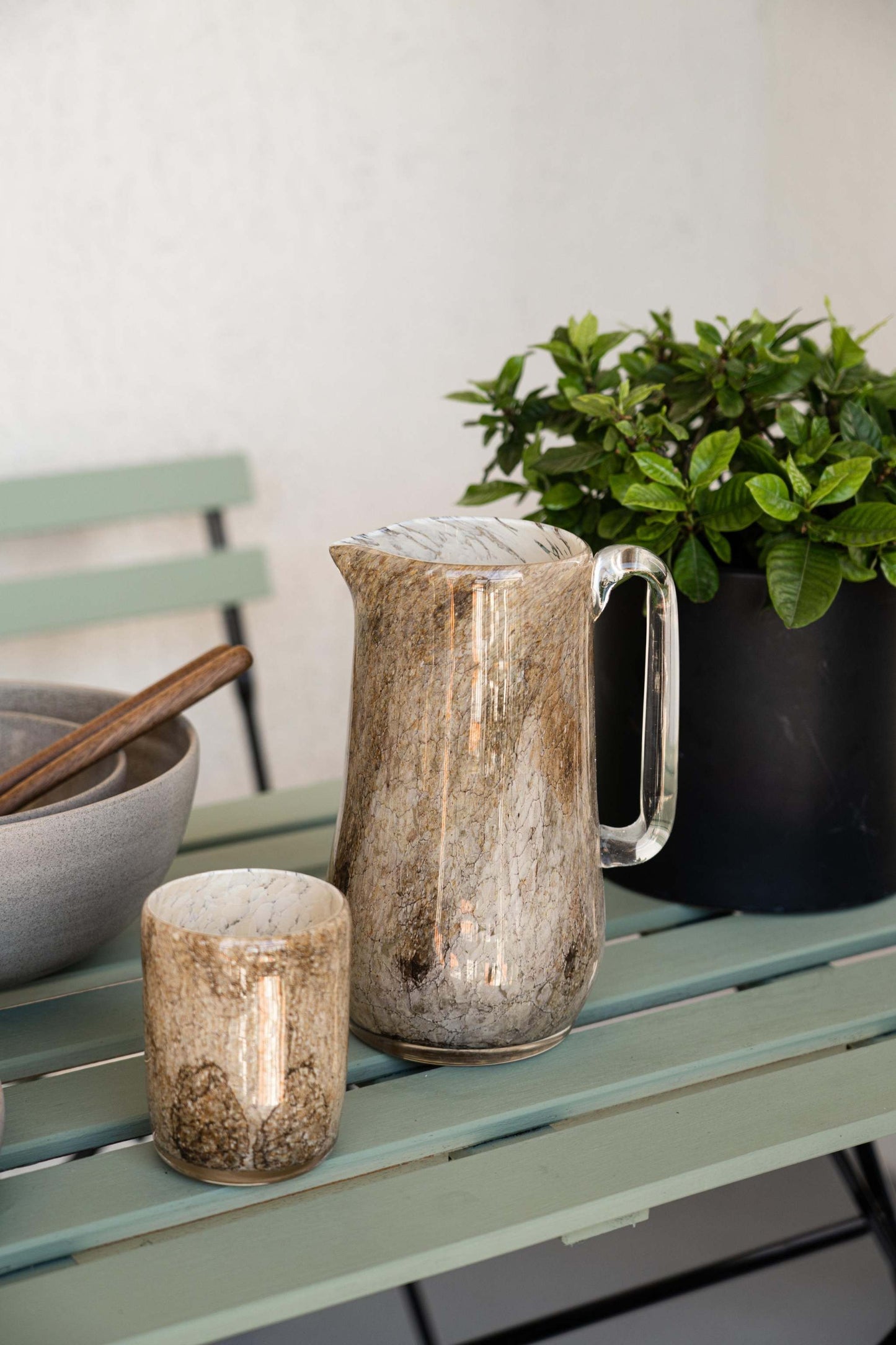 Hand blown glass tumbler with marble pattern and straight edges, unique handmade design from Ukraine