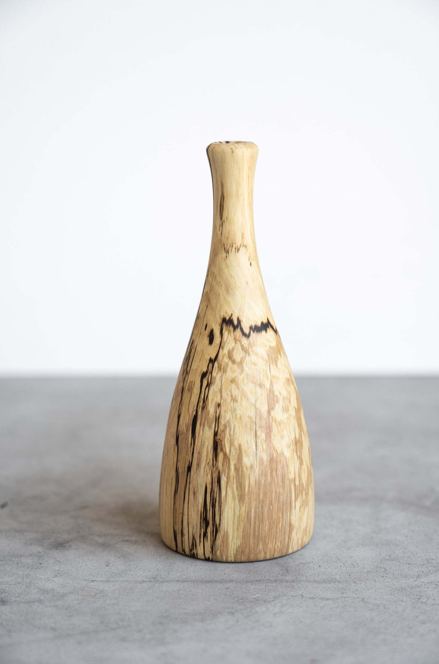 Handcrafted maple wood vase with smooth finish and natural grain patterns, small size, made in Ukraine