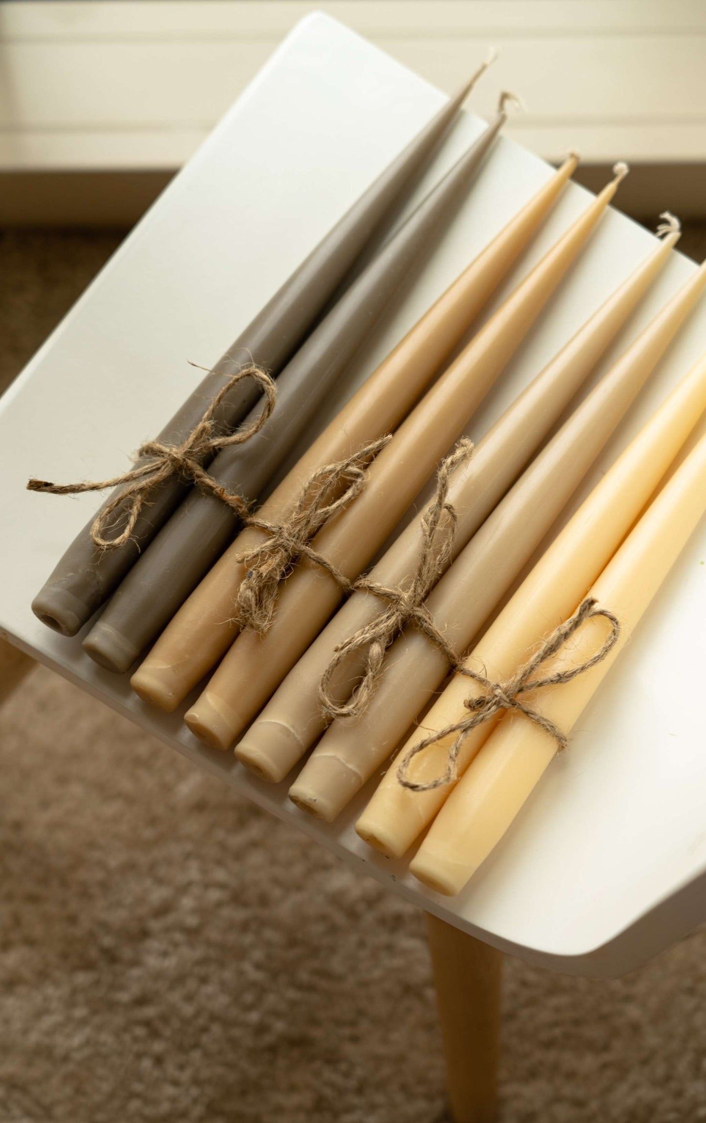 Set of handmade narrow taper candles in glass holders, four colors, 9.85" height, made with soy wax and cotton wick for long burn.