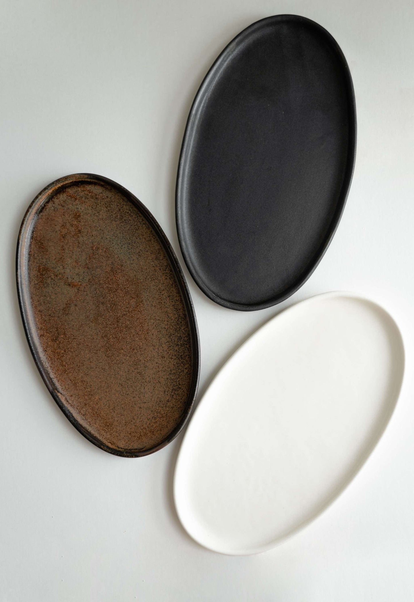 White matte stoneware oval serving platter handmade with food-safe glaze