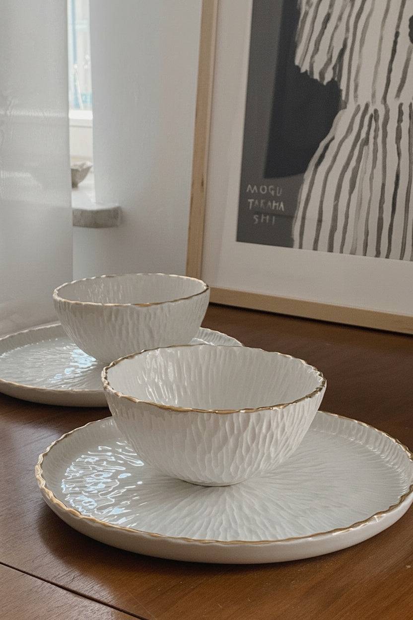 Handmade porcelain dinner plates with gold rim and hand-carved relief texture from Relief Collection