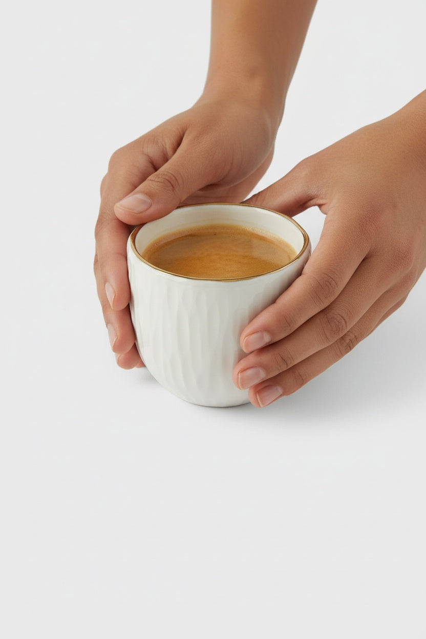 Handmade White Porcelain Coffee Cup with Gold Rim. Relief Collection