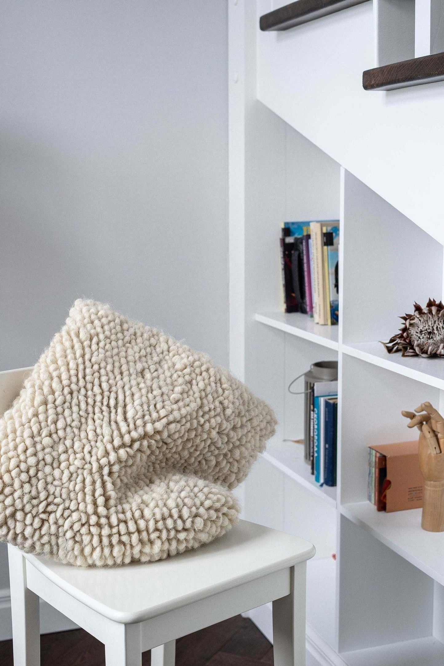 Handwoven wool decorative pillow with chunky yarn and oversized stones pattern, 18x18 inches, cozy and supportive