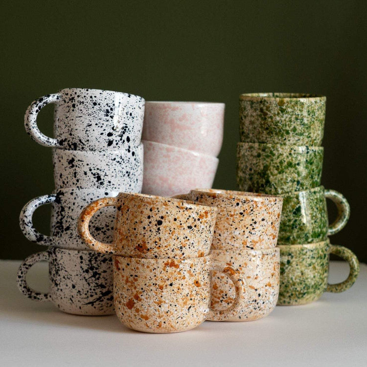 Hand painted splatter ceramic personalized stoneware mug with double handle showcasing unique artisan glaze and glossy finish