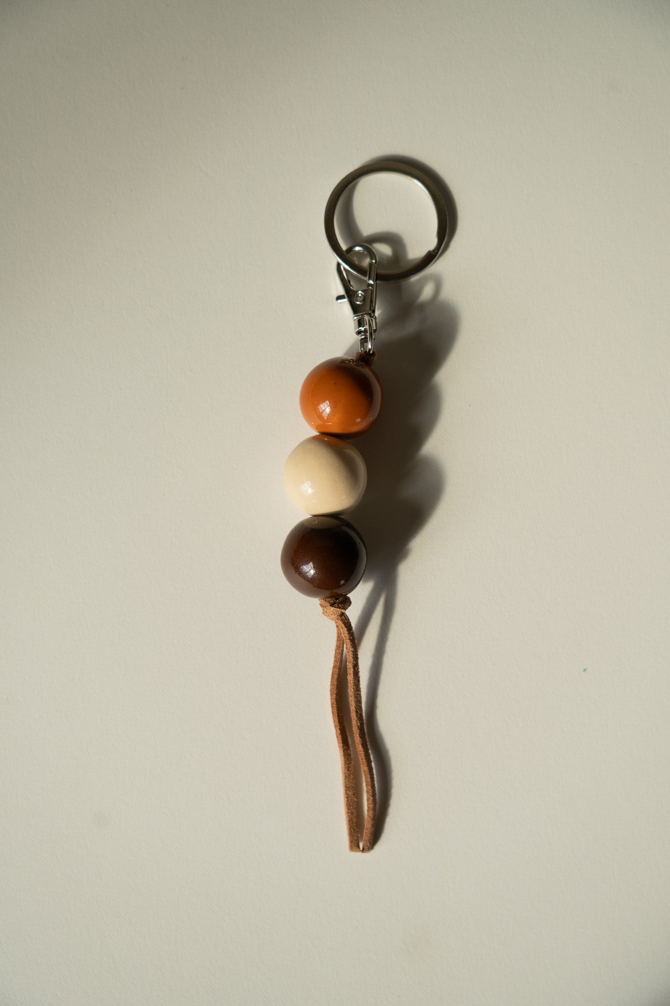 Handmade Ceramic Beaded Keychain in Dark Brown Tones