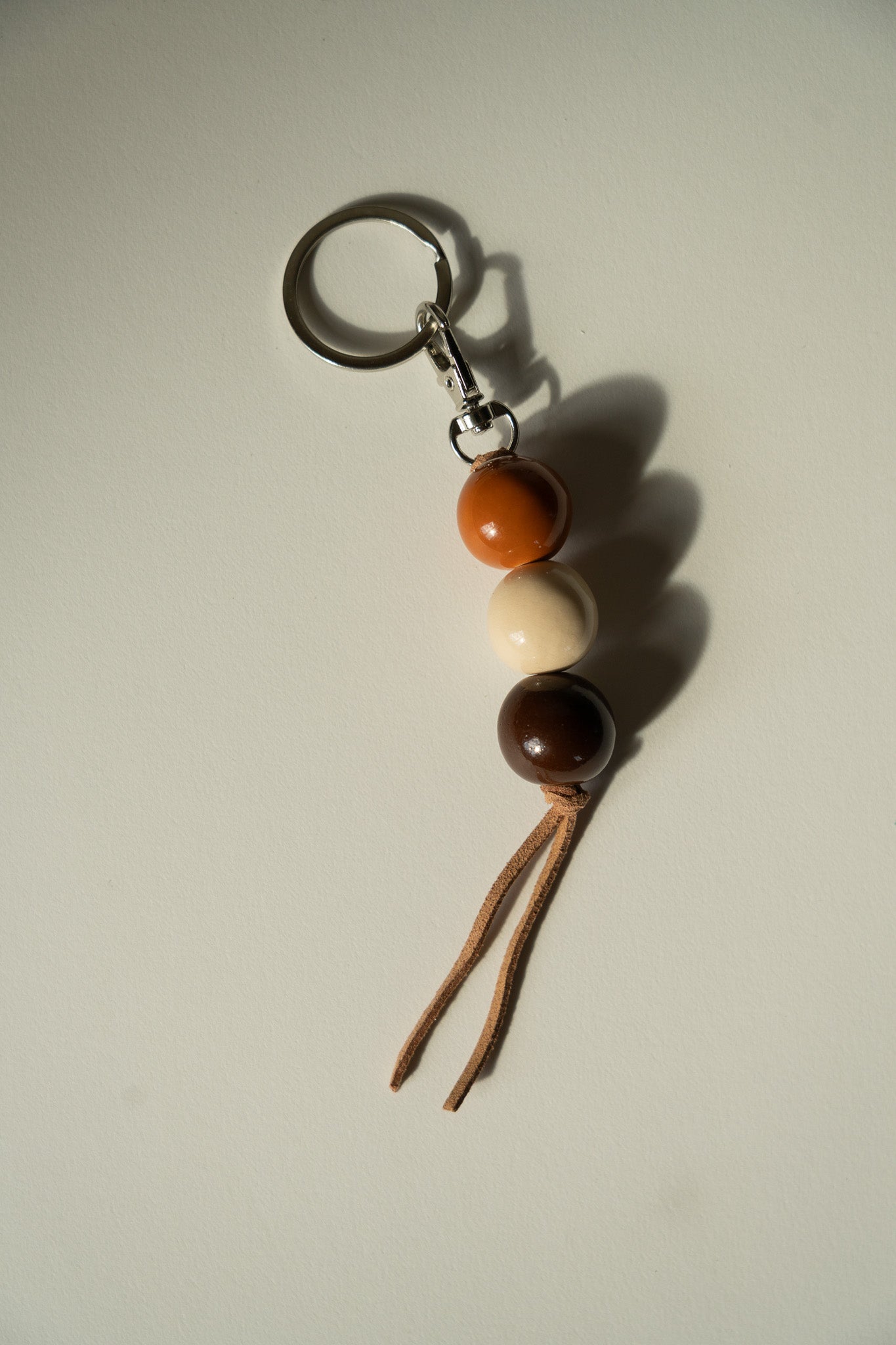 Handmade Ceramic Beaded Keychain in Dark Brown Tones