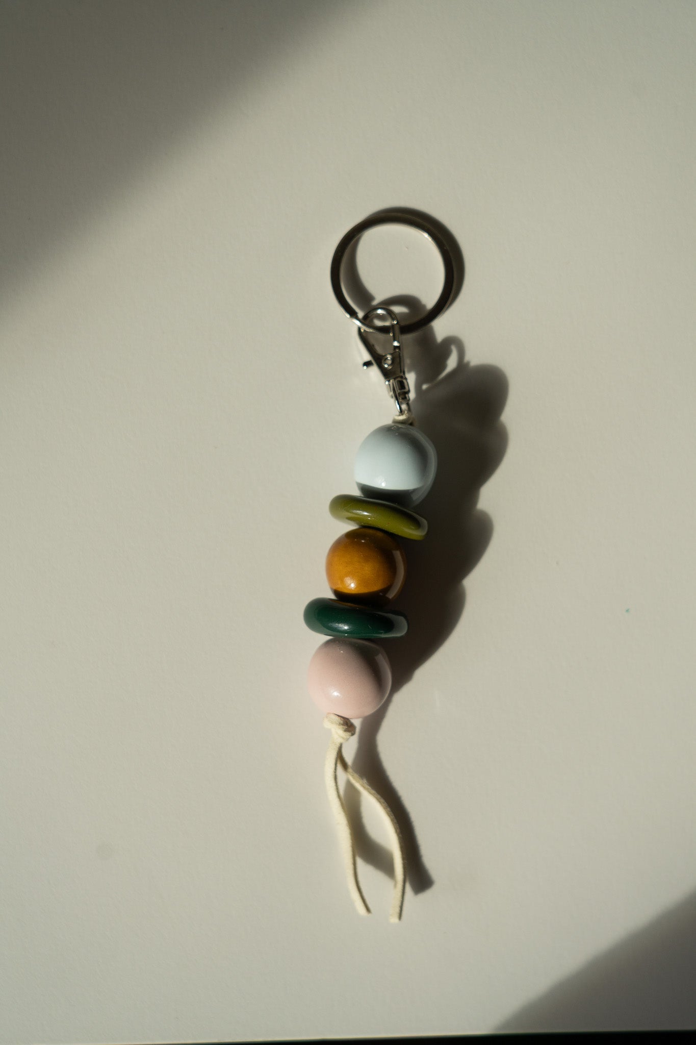 Handmade Ceramic Beaded Keychain in Brown and Green Tones