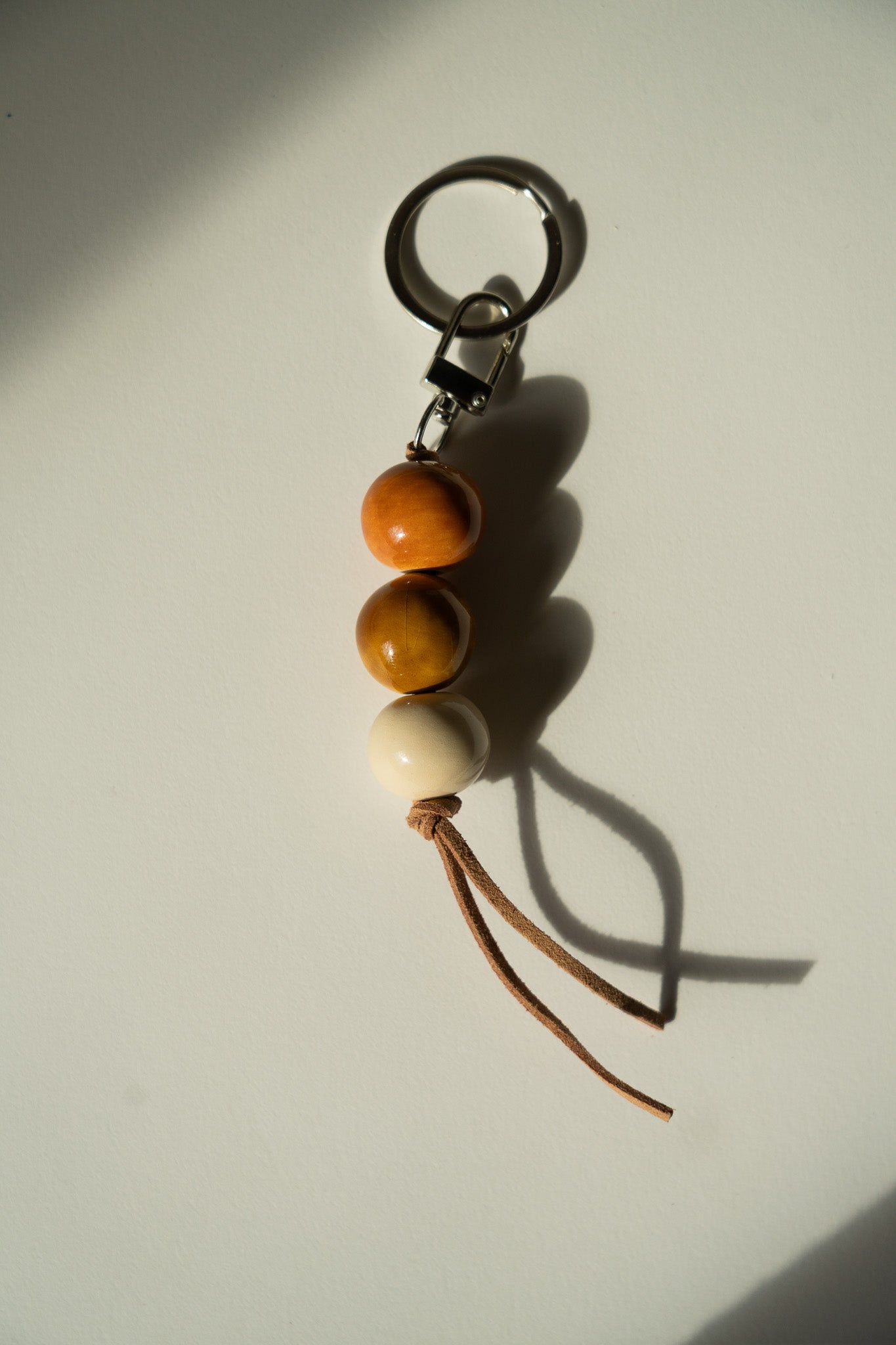 Handmade Ceramic Beaded Keychain in Warm Brown Tones