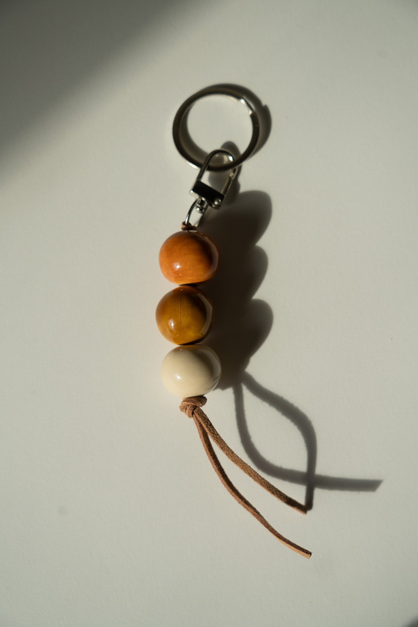 Handmade Ceramic Beaded Keychain in Warm Brown Tones