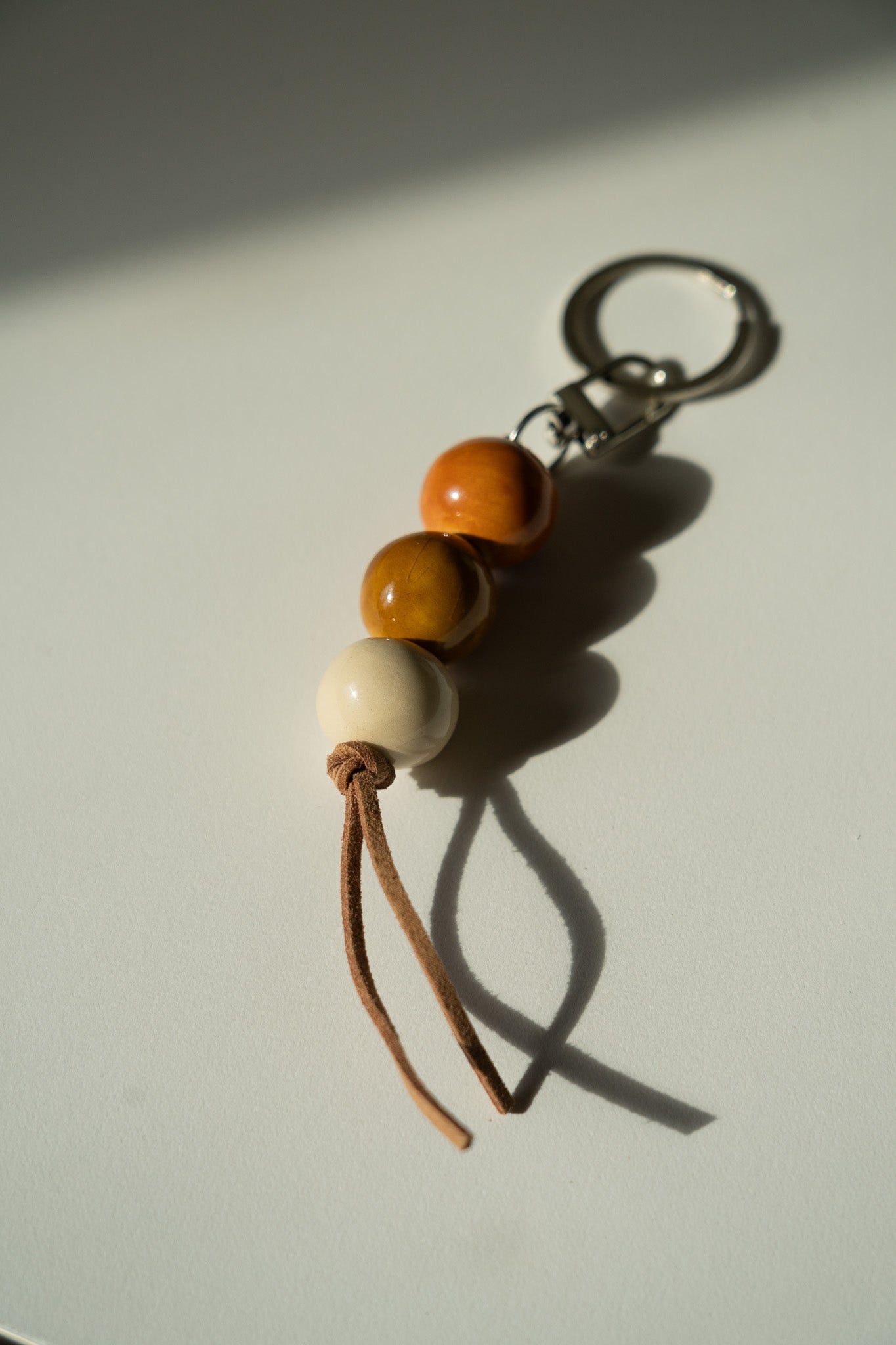 Handmade Ceramic Beaded Keychain in Warm Brown Tones