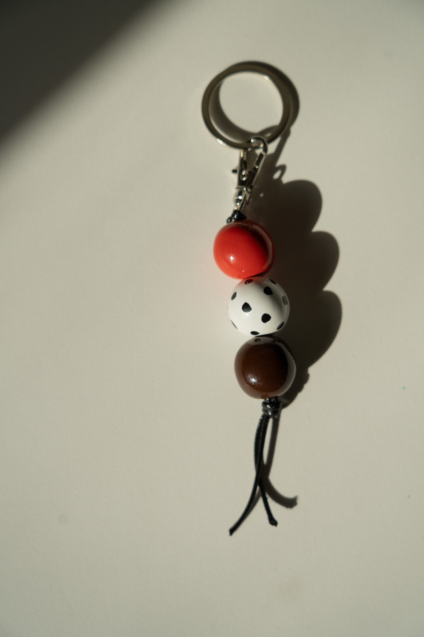 Handmade Ceramic Beaded Keychain in Brown and Red Tones