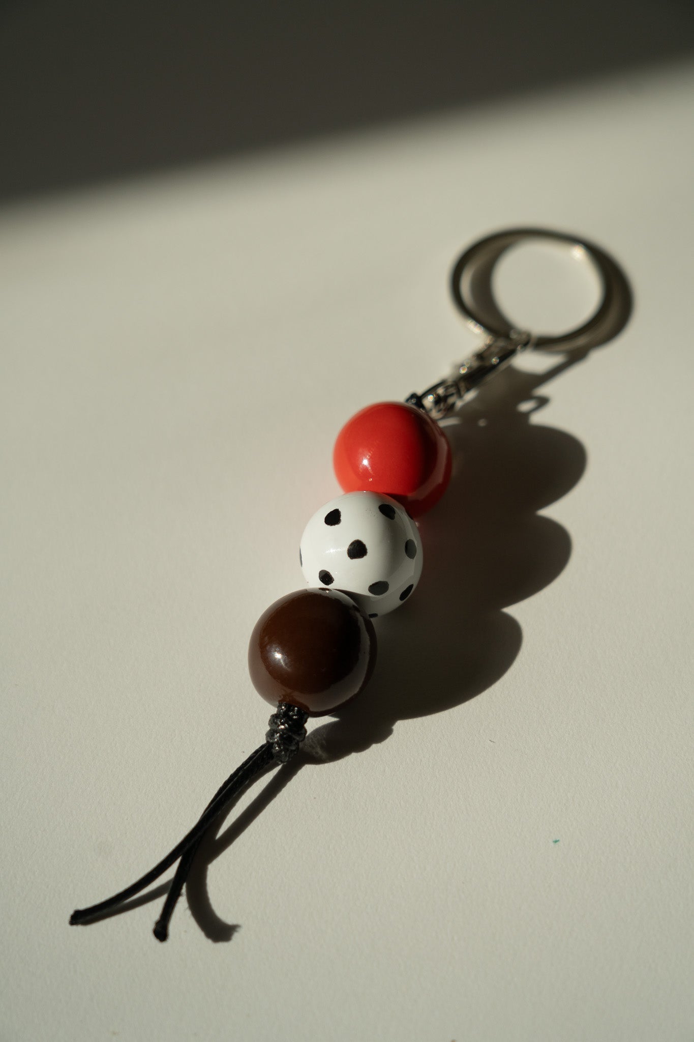 Handmade Ceramic Beaded Keychain in Brown and Red Tones