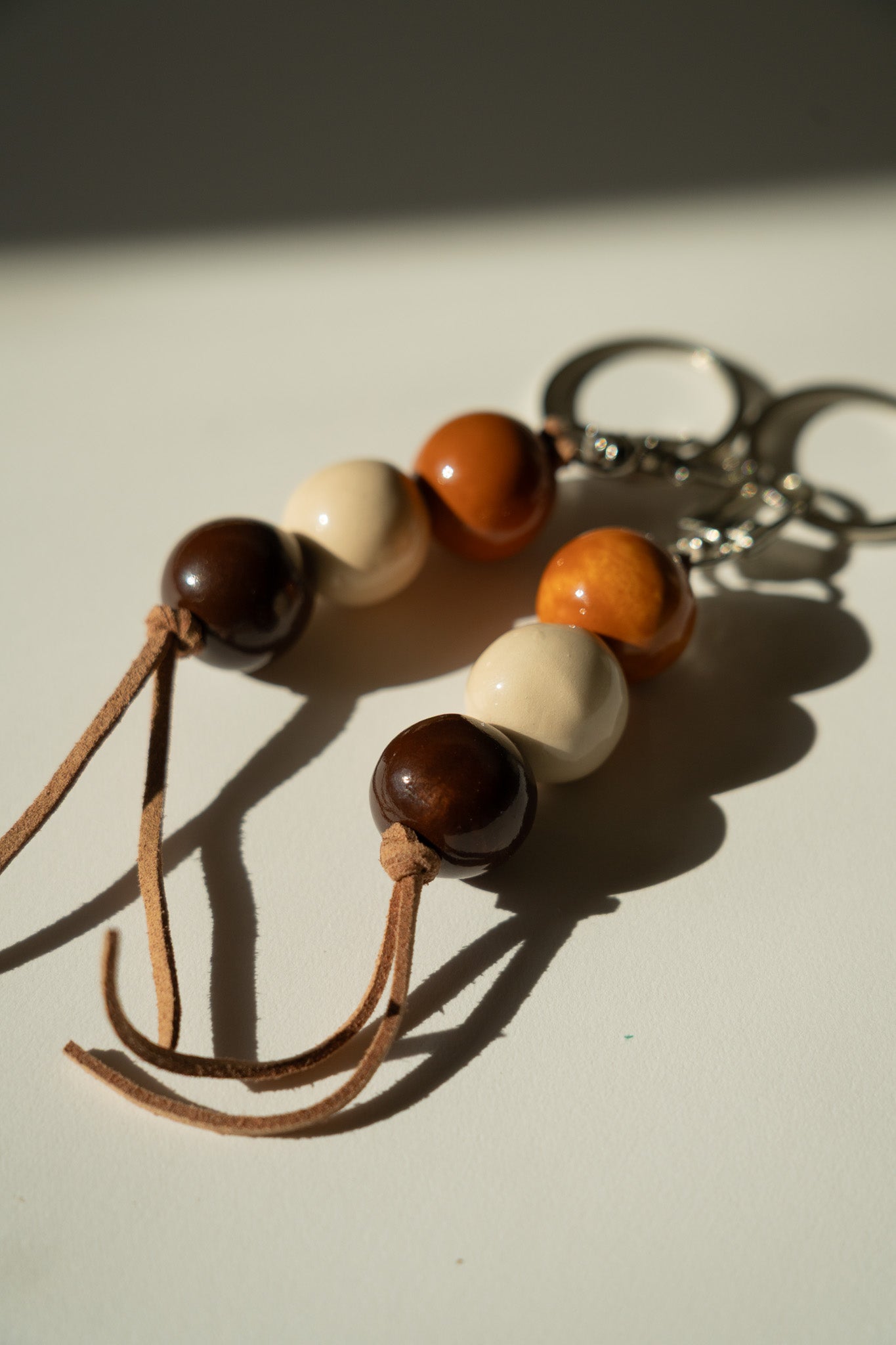 Handmade Ceramic Beaded Keychain in Dark Brown Tones