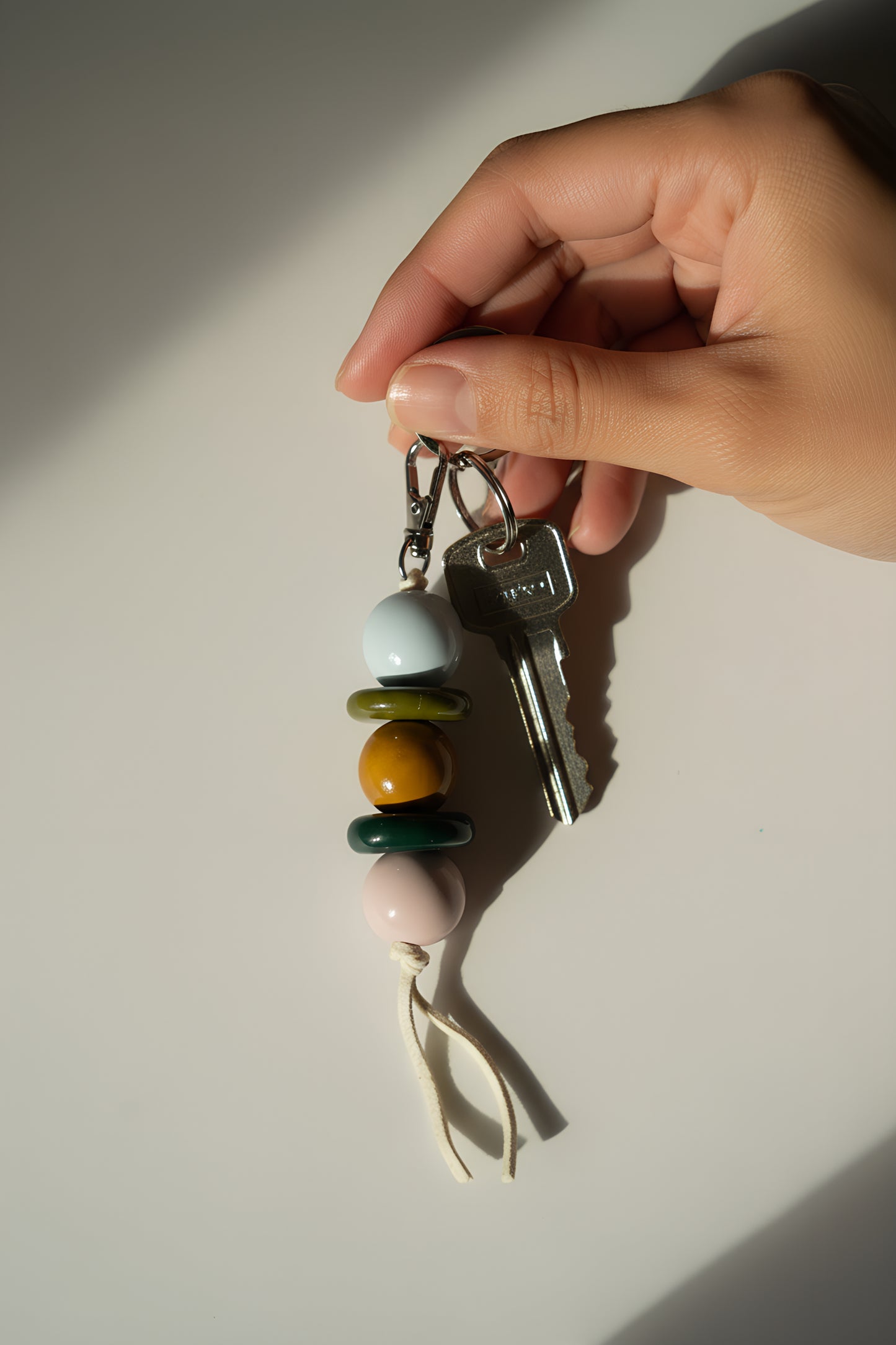 Handmade Ceramic Beaded Keychain in Brown and Green Tones