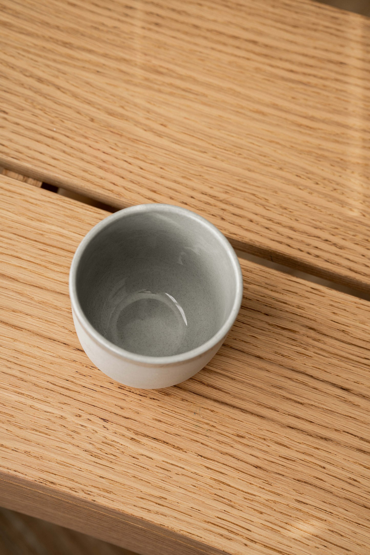 Handmade Porcelain Coffee Cup. Gray Sky