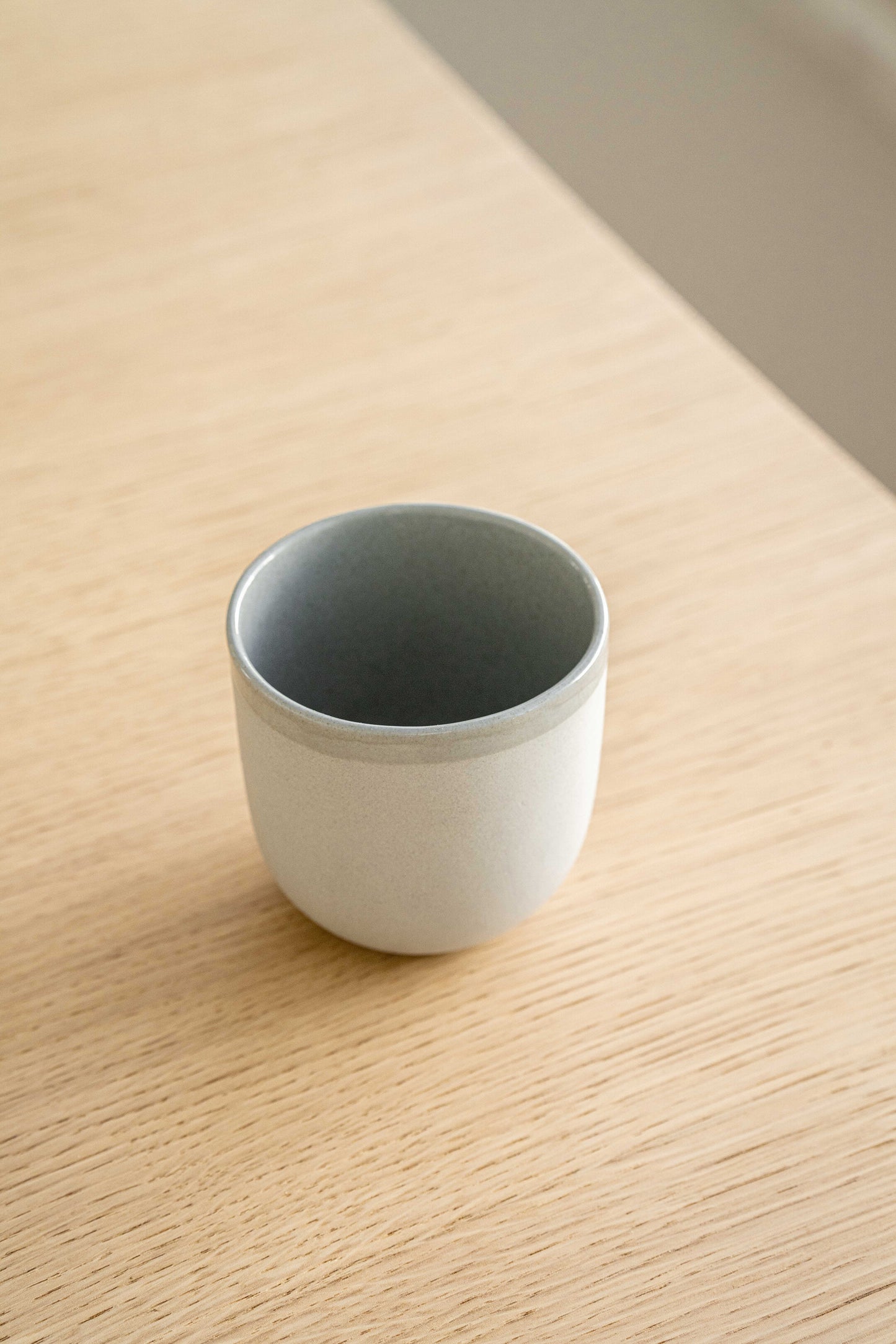 Handmade Porcelain Coffee Cup. Gray Sky